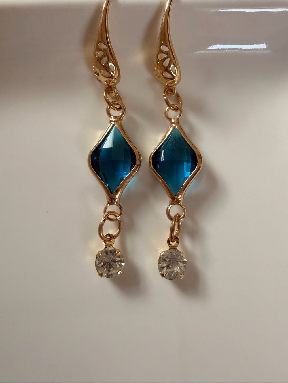 Gold Drop Earrings with Deep Teal Blue Crystal Charm